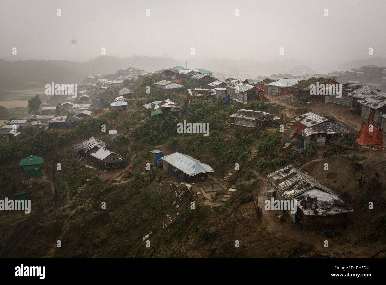 A part of Chakmakul, one of the camps sheltering over 800,000 Rohingya refugees is seen during a heavy downpour, Cox's Bazar, Bangladesh, July 4, 2018 Stock Photo
