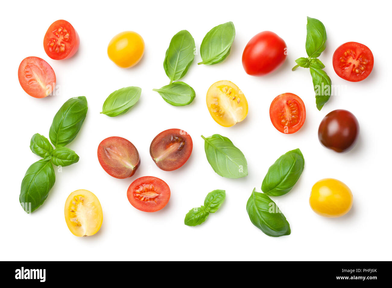 Tomatoes and Basil Leaves Isolated on White Background Stock Photo - Alamy