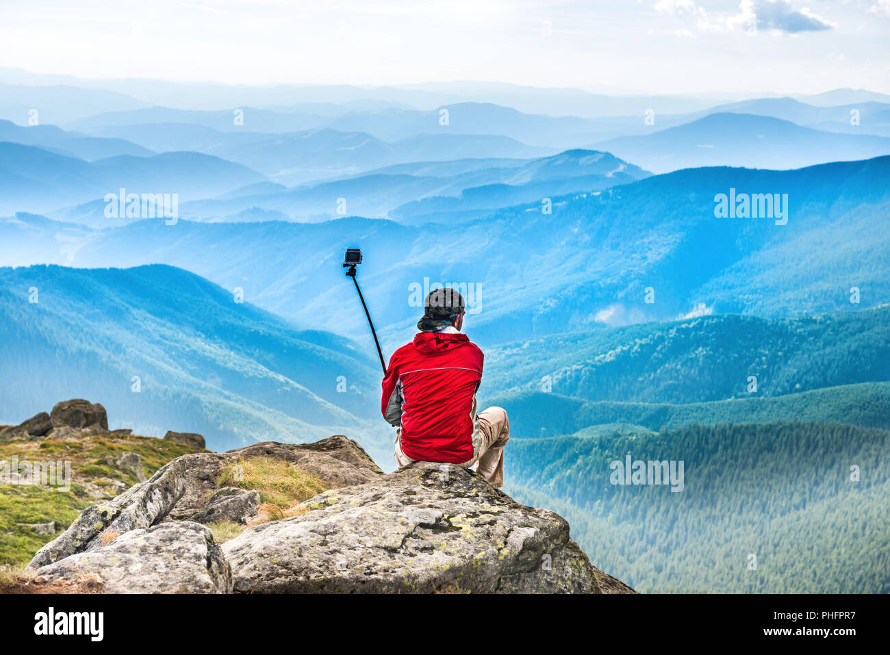 Young man mountain hi-res stock photography and images - Alamy