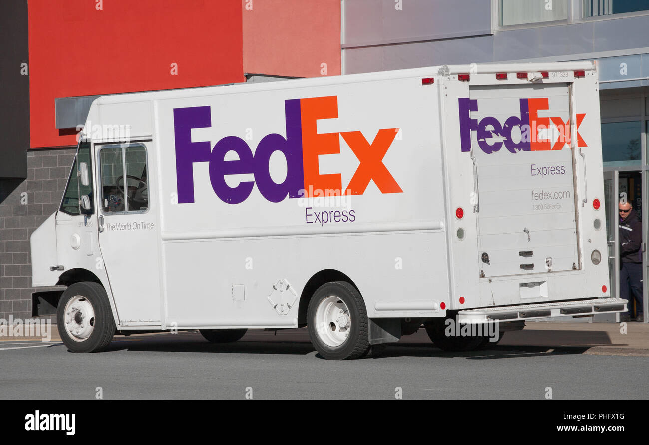TRURO, CANADA - DECEMBER 6, 2016: Parked FedEx delivery truck. FedEx Corporation is an American courier company based in Memphis, Tennessee and operat Stock Photo