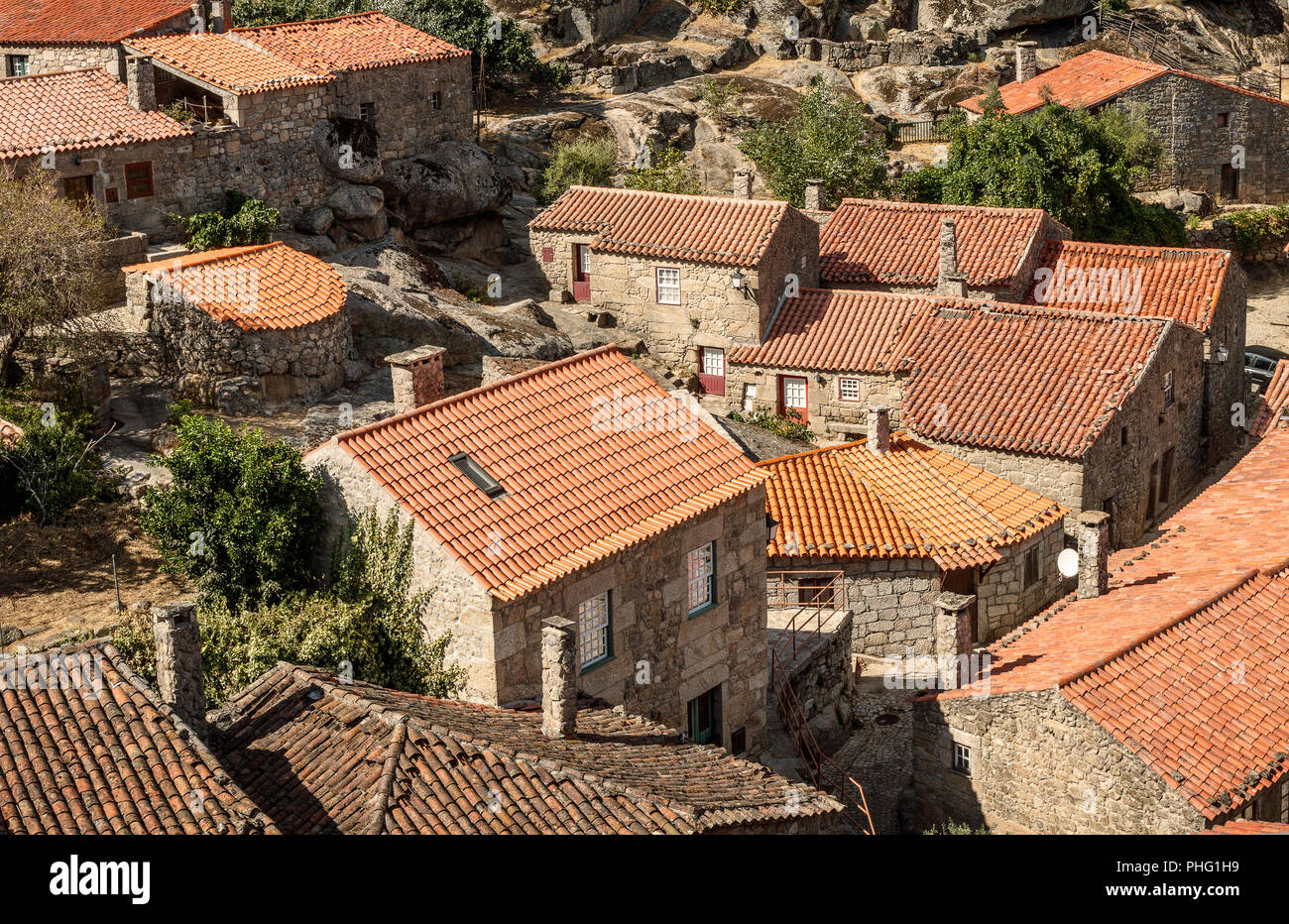 view of roofs and houses of Sortelha, in Portugal. - Vista de telhados e casas de Sortelha, Portugal. Stock Photo