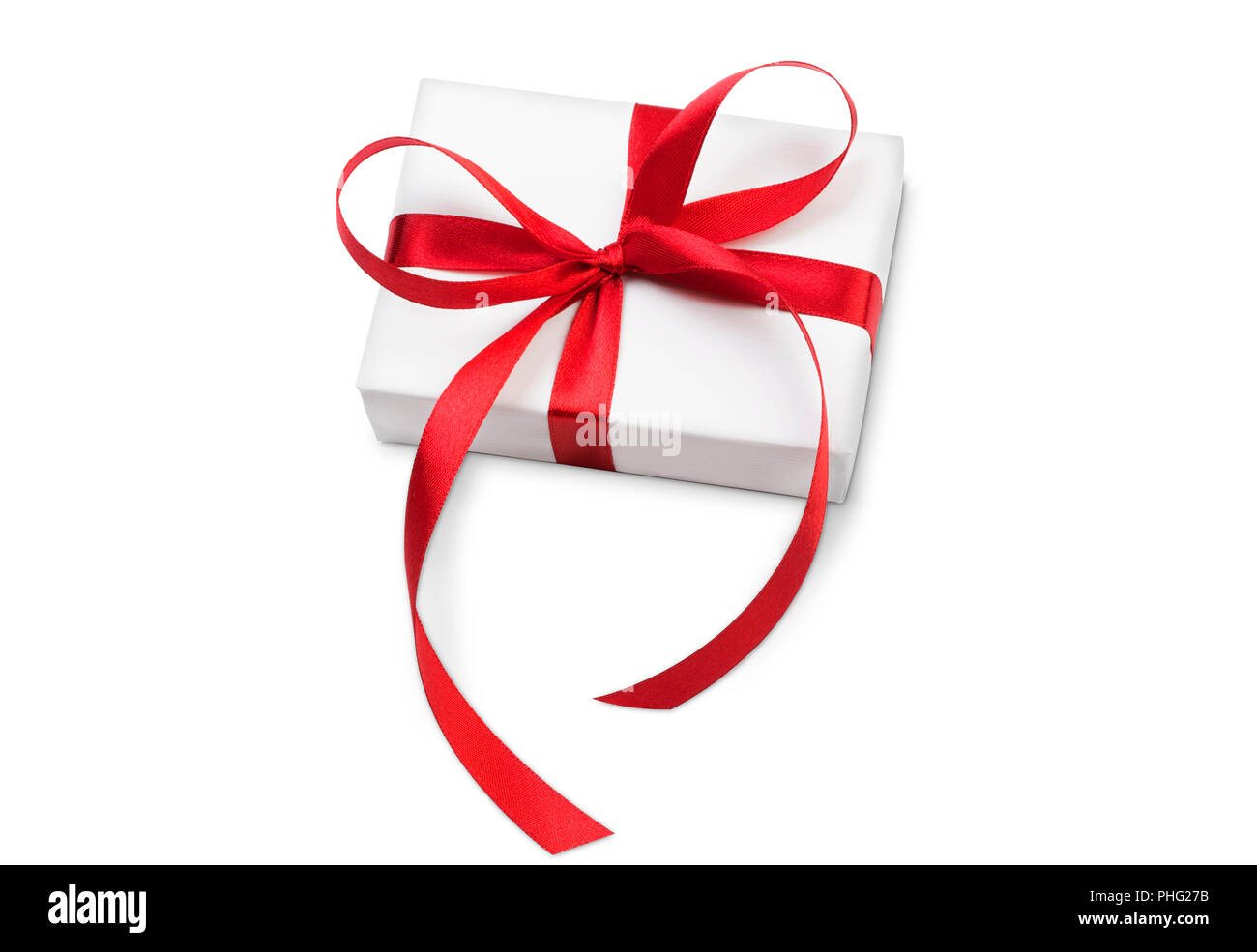 White gift box with red ribbon on white background Stock Photo - Alamy