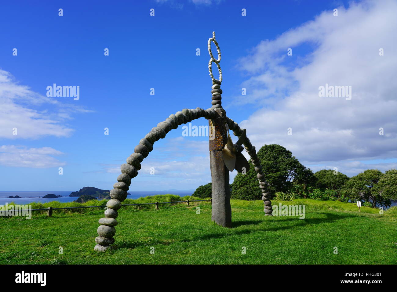 MATAURI BAY, NEW ZEALAND -View of the Rainbow Warrior Memorial, a monument to the victims of the Greenpeace ship sunk by France above Matauri Bay, NZ. Stock Photo