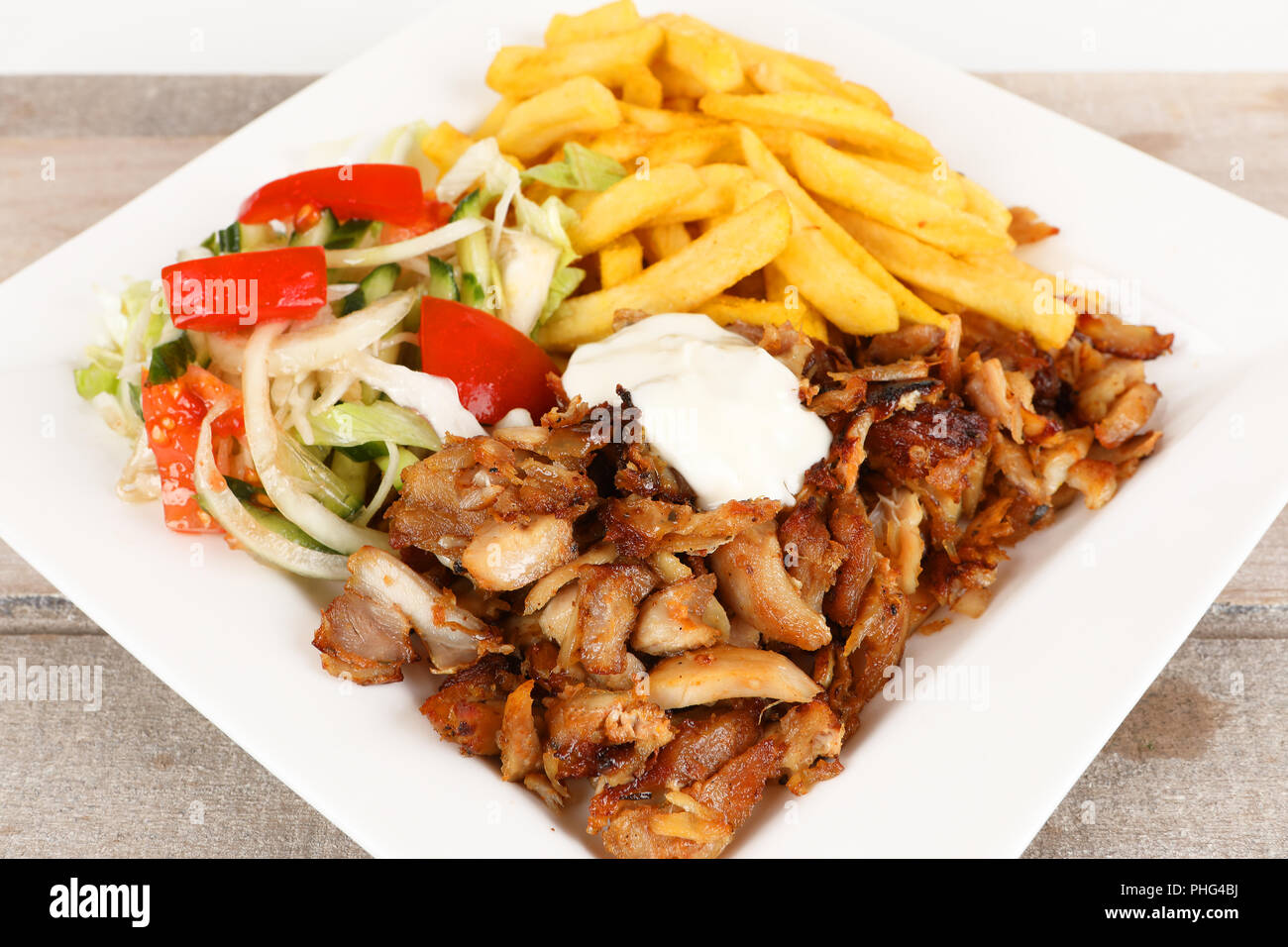 chicken doner with fries and salad Stock Photo