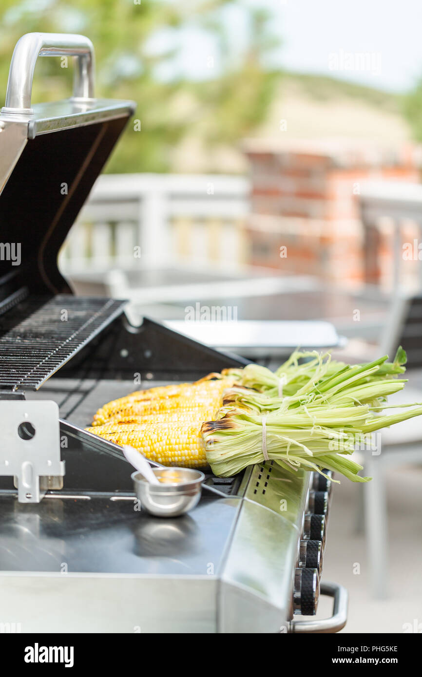 Grilling mexican street corn elote on outdoor gas grill Stock Photo Alamy