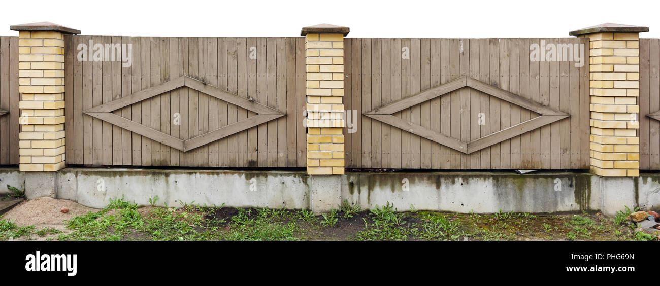 Fragment of a solid fence in rural style Stock Photo