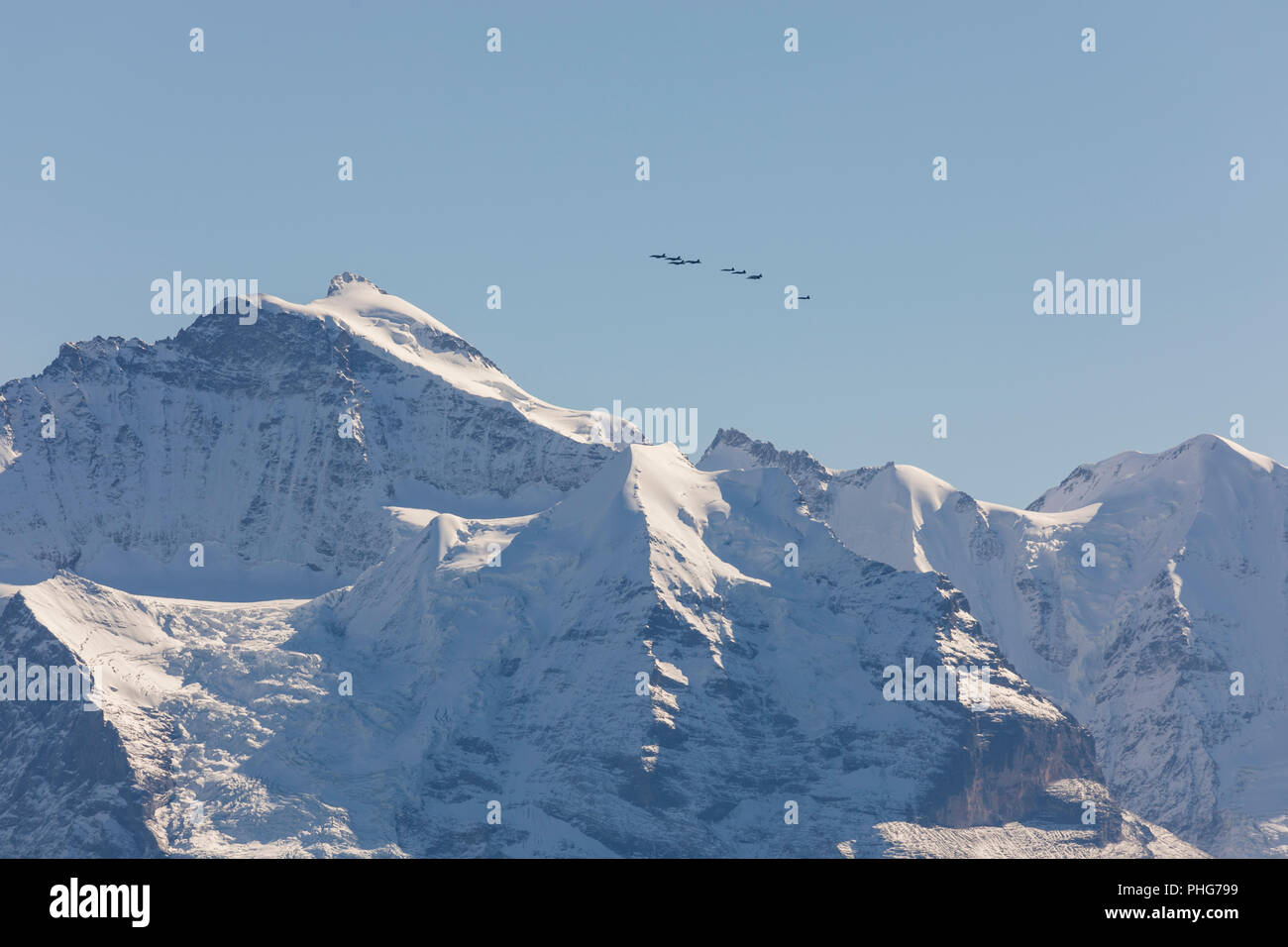 The Swiss Air Force flies a display over the Alps in the Bernese Oberland Stock Photo