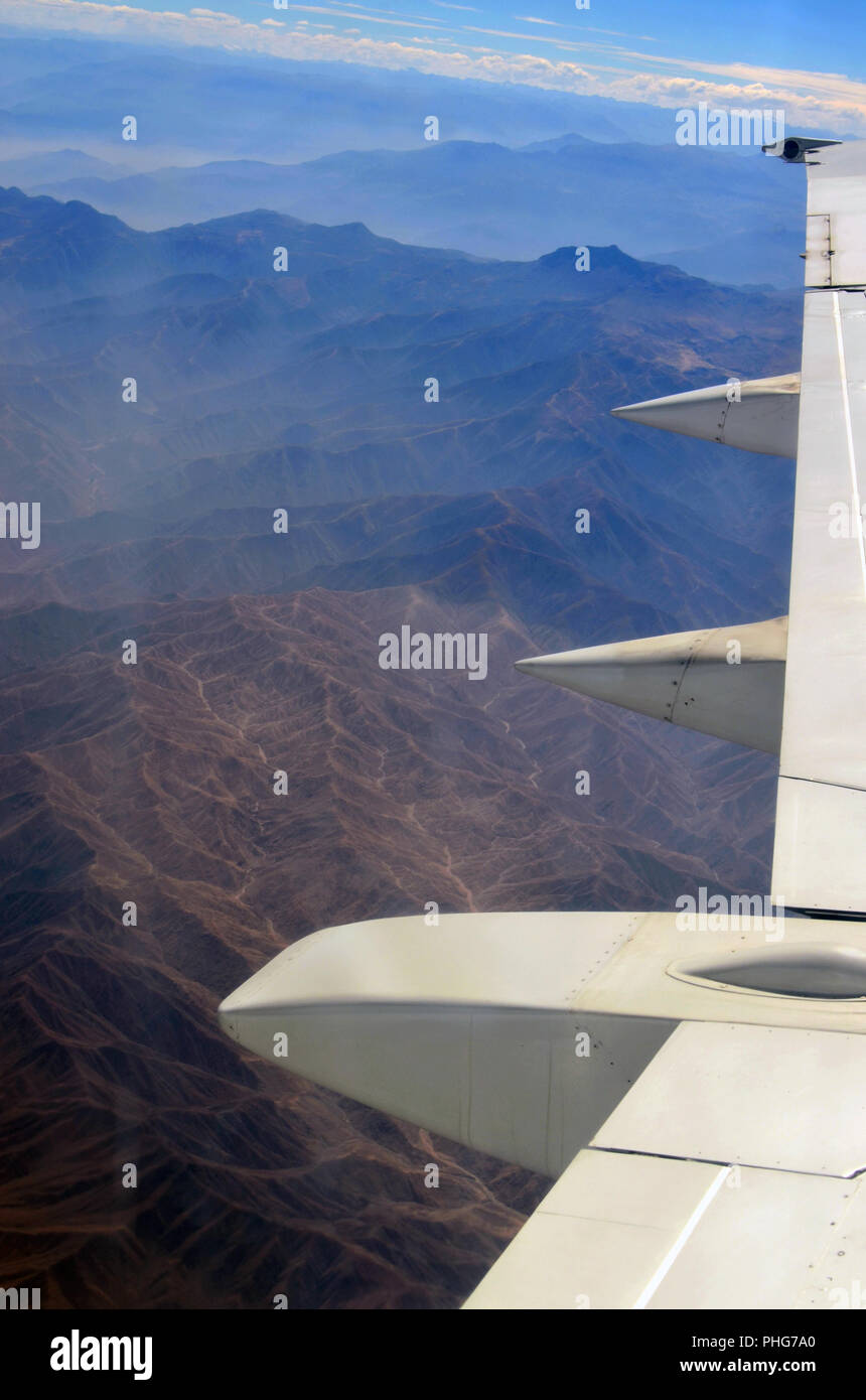 Andes under plane wing Stock Photo