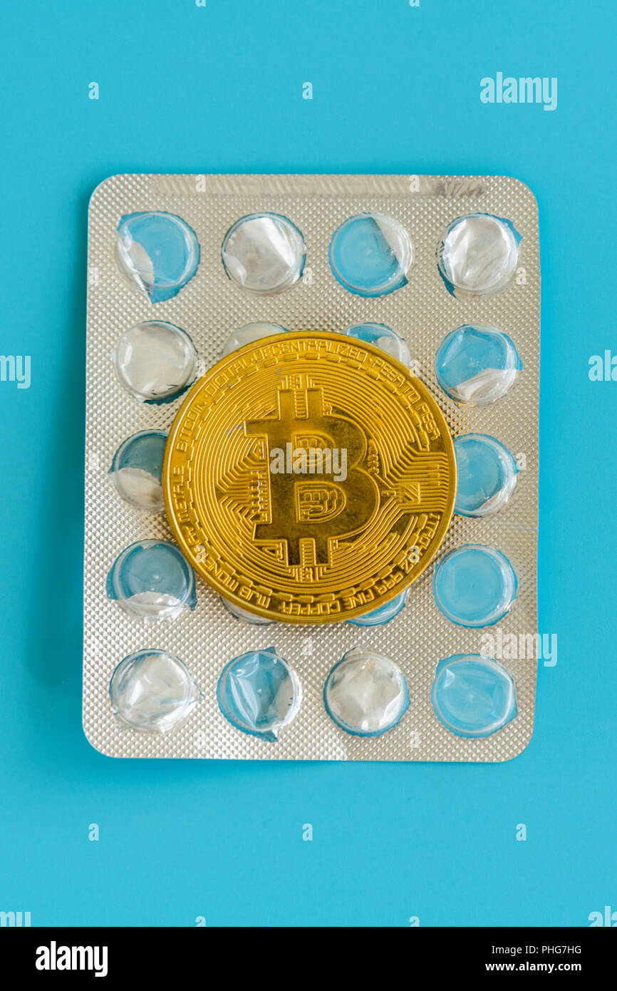 Bitcoin and pills on a blue background. Bitcoin as a medicine for the  economy. Cryptocurrency bitcoin as a payment option for medicines. The  concept o Stock Photo - Alamy
