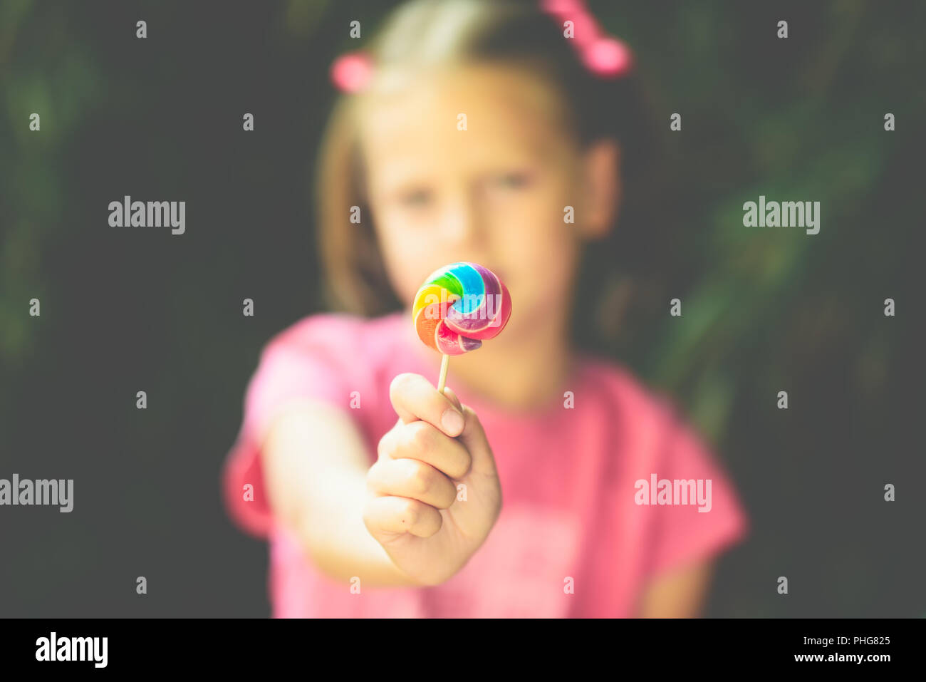 Pretty little girl lollipop hi-res stock photography and images - Alamy