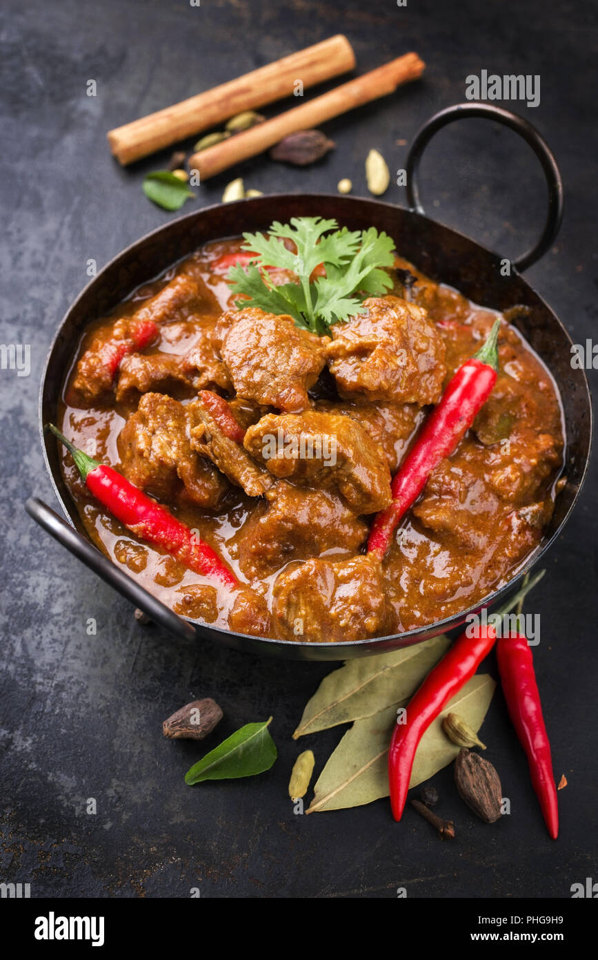 Traditional Indian curry lamb masala as closeup in a Korai Stock Photo