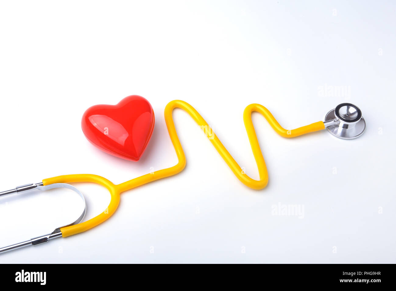 Red heart and a stethoscope on white background Stock Photo - Alamy