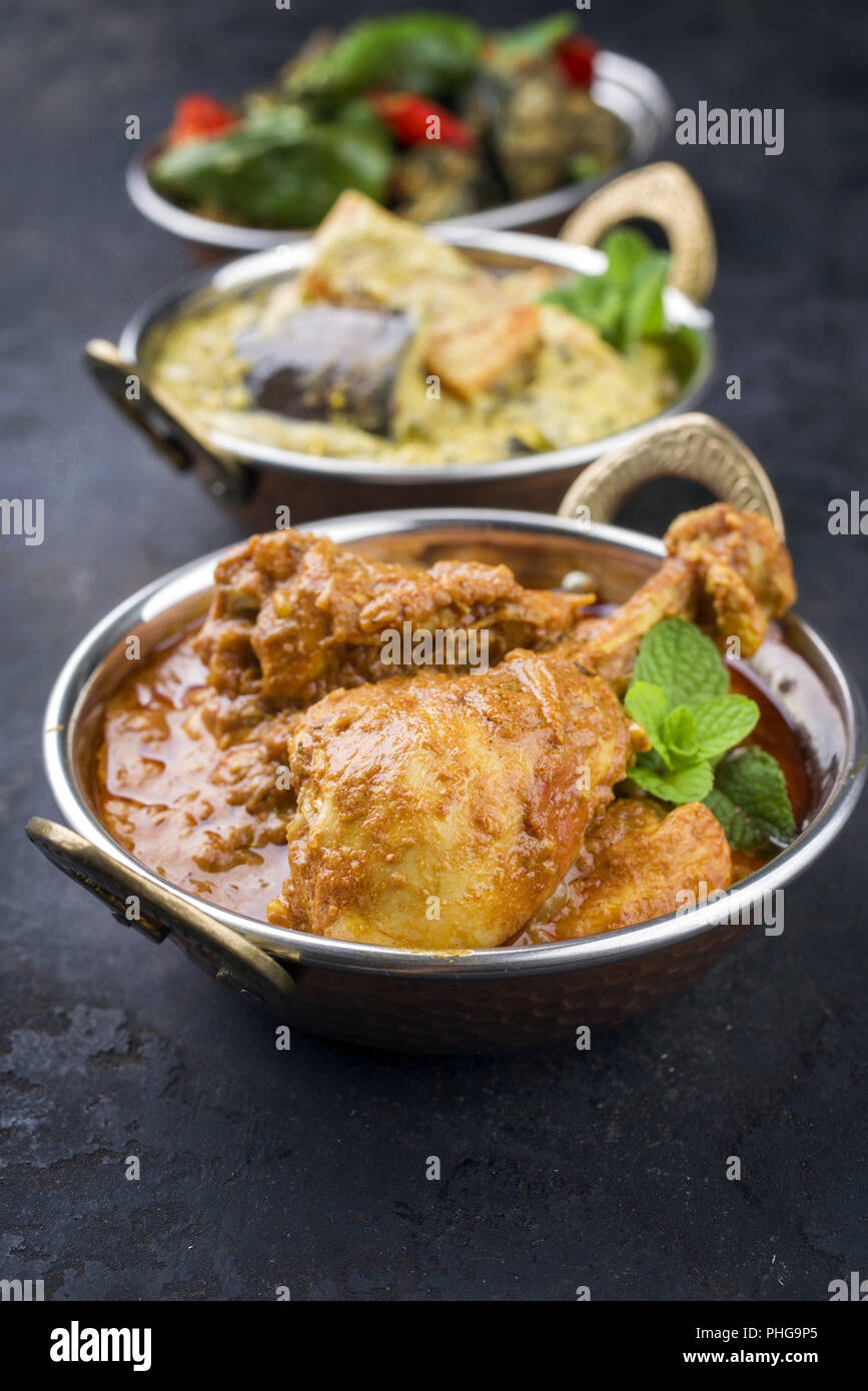 Traditional Indian Curries with Chicken and Vegetable as closeup Korai Stock Photo Alamy
