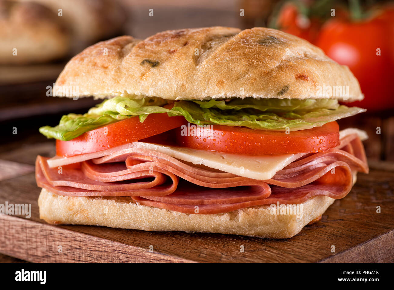 A delicious deli sandwich on cheddar jalapeno ciabatta bread with