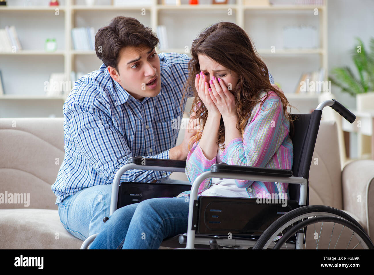 Desperate disabled person on wheelchair Stock Photo - Alamy