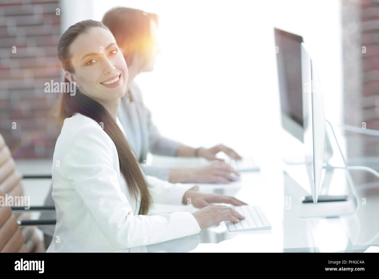 employee of the company working at their workplace Stock Photo - Alamy