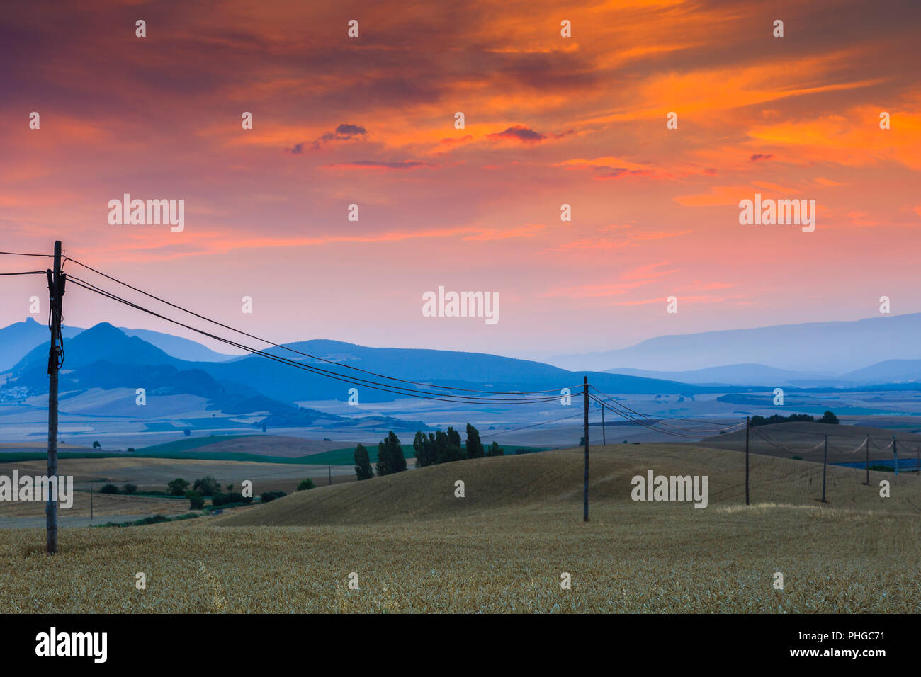 Sunset and cereal farmland. Tierra Estella. Navarre, Spain, Europe. Stock Photo