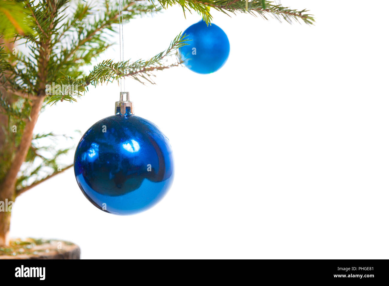 Blue holiday balls on christmas tree Stock Photo - Alamy