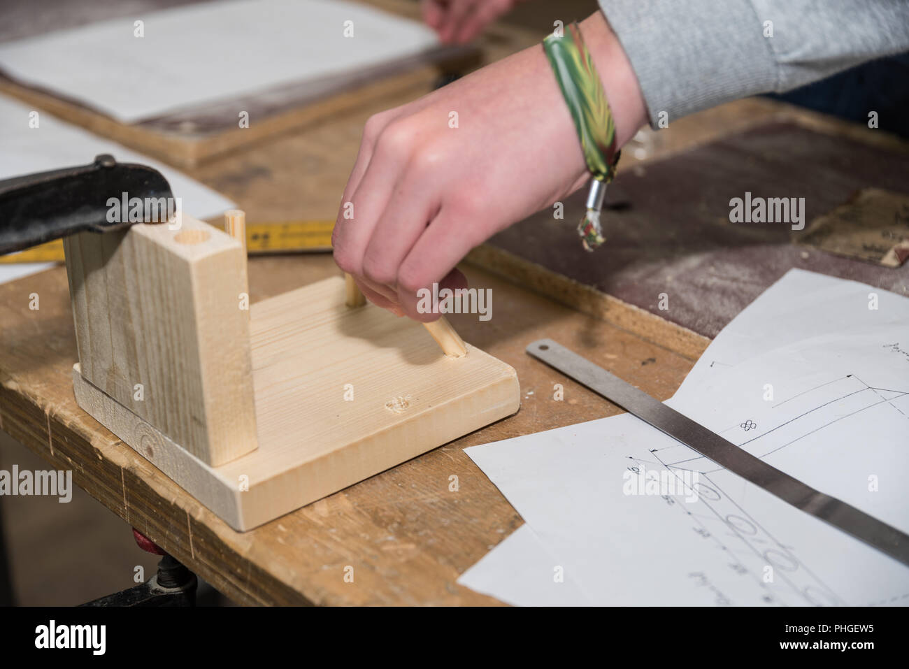Joiner constructs wood joints - close-up Stock Photo