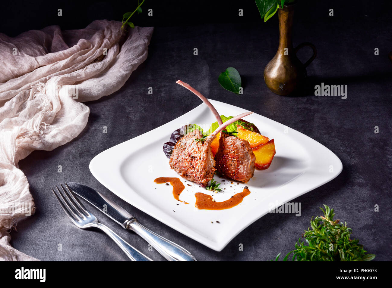 Grilled lamb chops with potatoes Stock Photo - Alamy