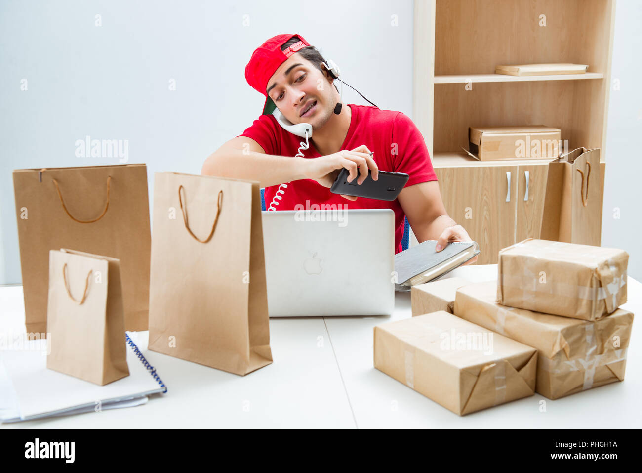 Call center worker at parcel distribution center in post office Stock ...