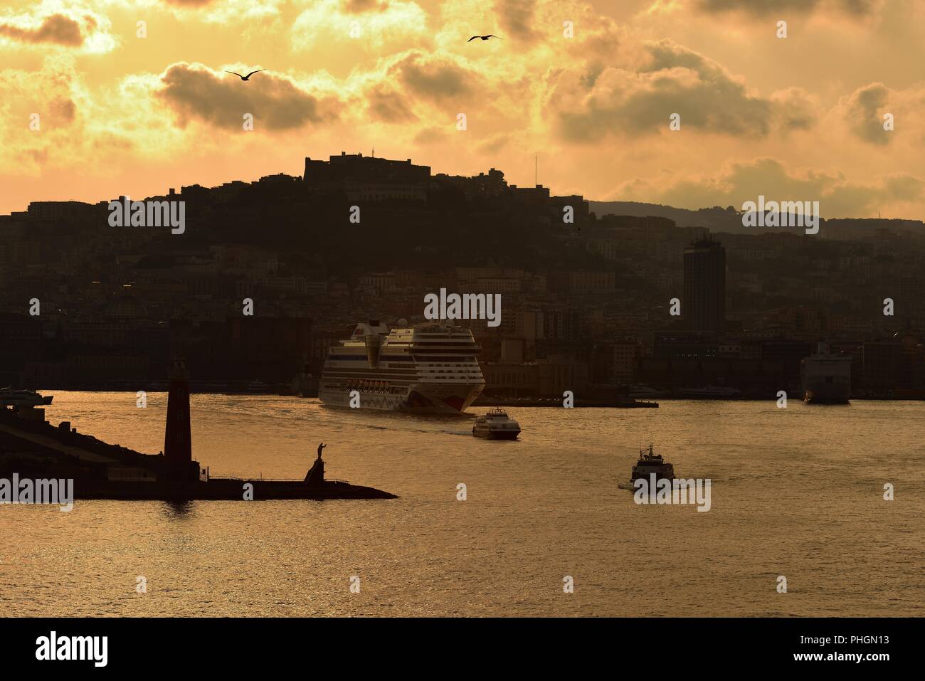 Adia Stella, Naples, Italy - July 18:Aida Stella leaving the Port of Naples at sunset Stock Photo