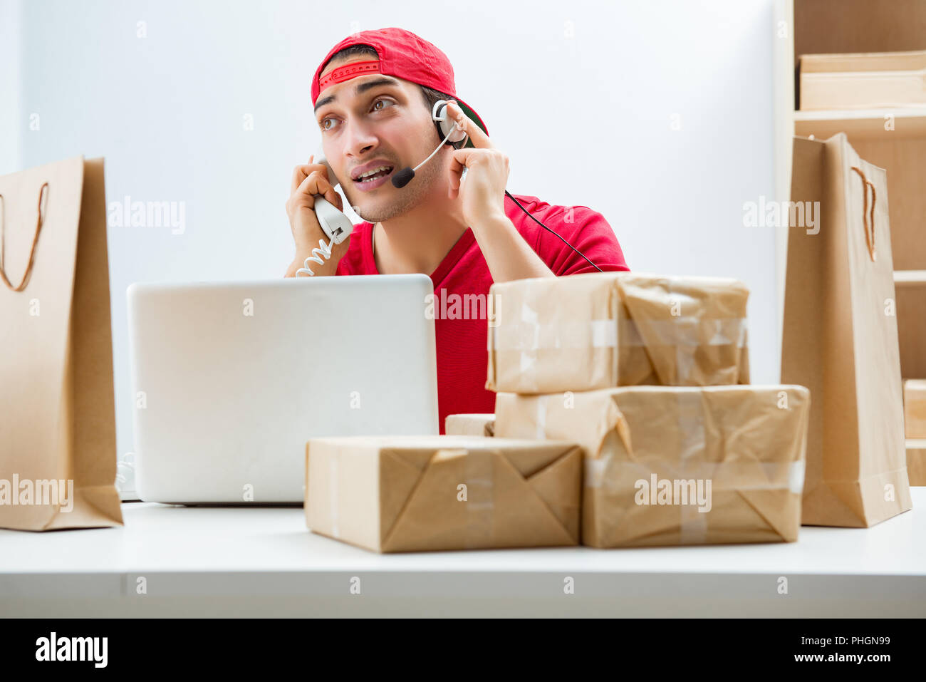 Call center worker at parcel distribution center in post office Stock ...