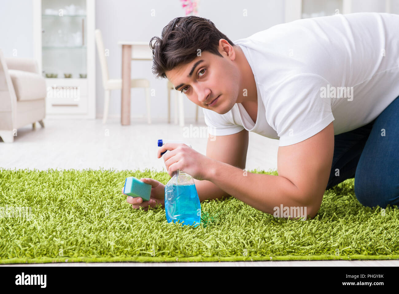 Young husband man cleaning floor at home Stock Photo Alamy