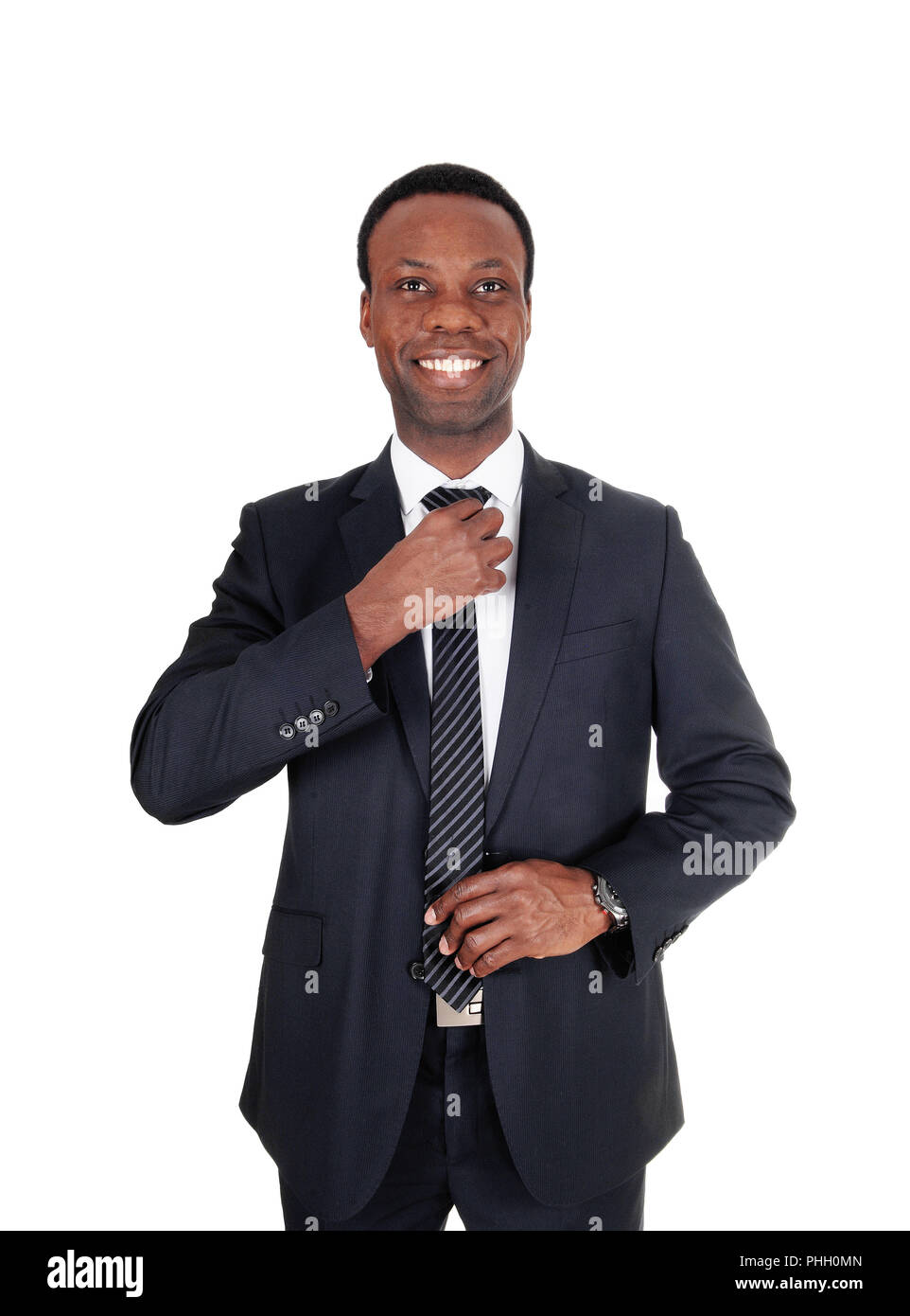 African business man fixing his tie Stock Photo - Alamy