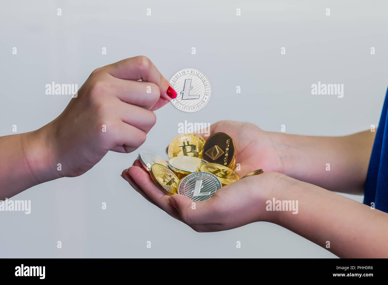Handful of crypto currencies Stock Photo