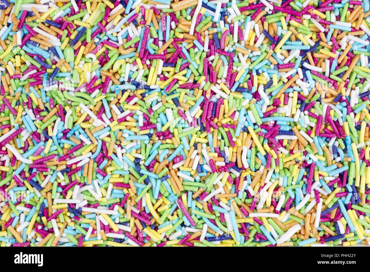 Rainbow sprinkles white background hires stock photography and images