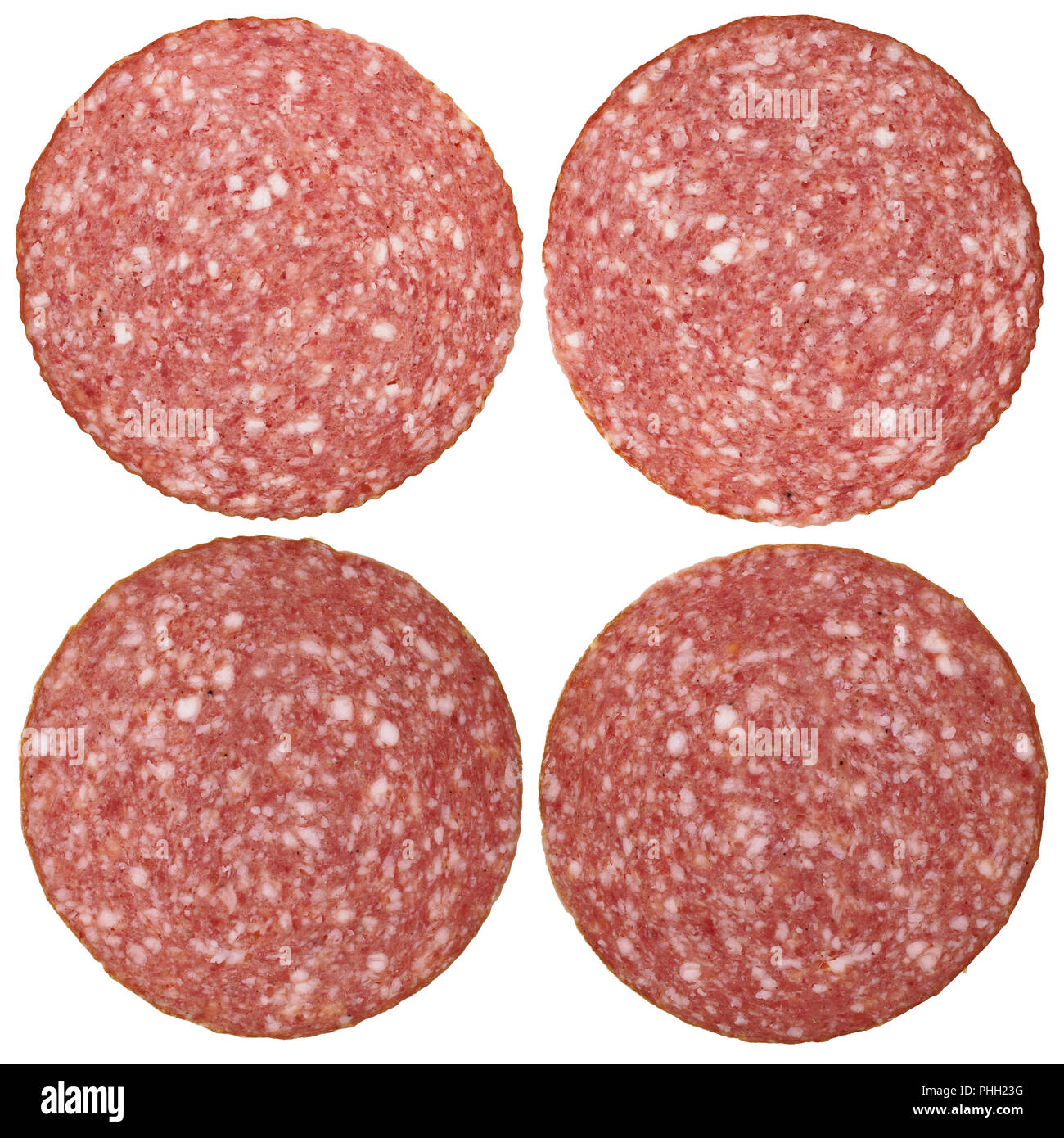 Four round pieces of a salami Stock Photo Alamy