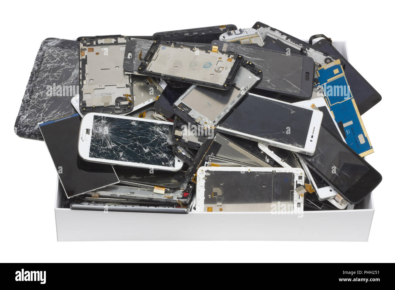 Broken phones and tablets  in the white cardboard box Stock Photo