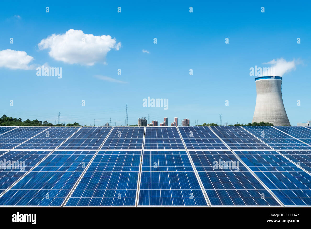 solar panel and cooling tower Stock Photo