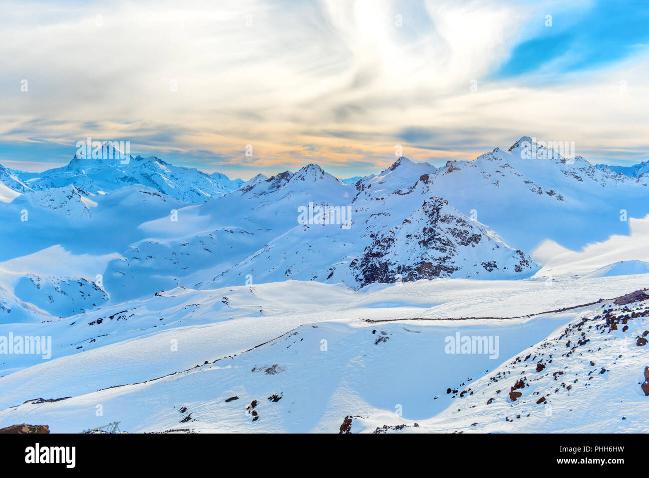 Snow winter peaks in mountains range Stock Photo