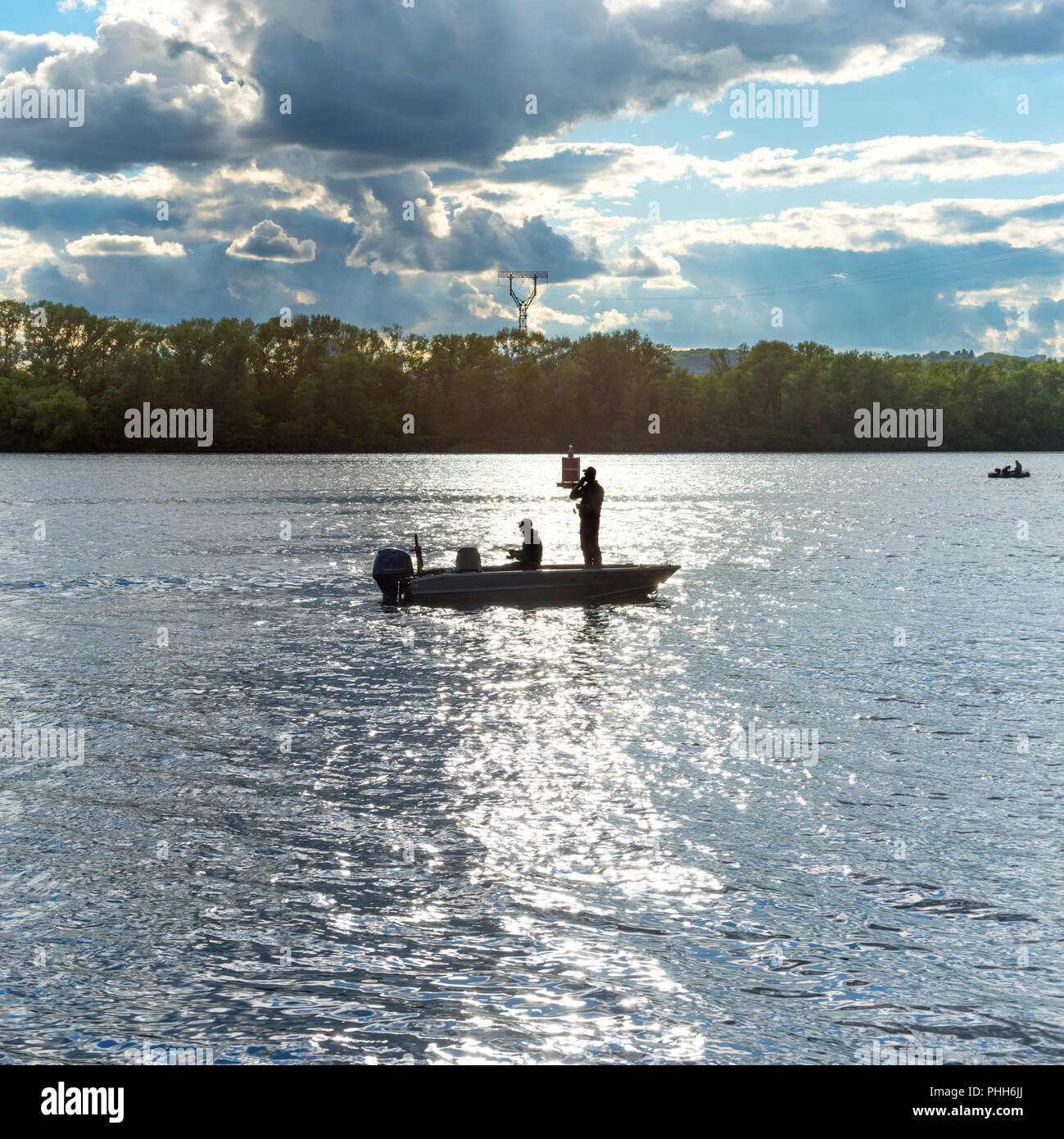Silhouette of fishing boat hi-res stock photography and images - Alamy