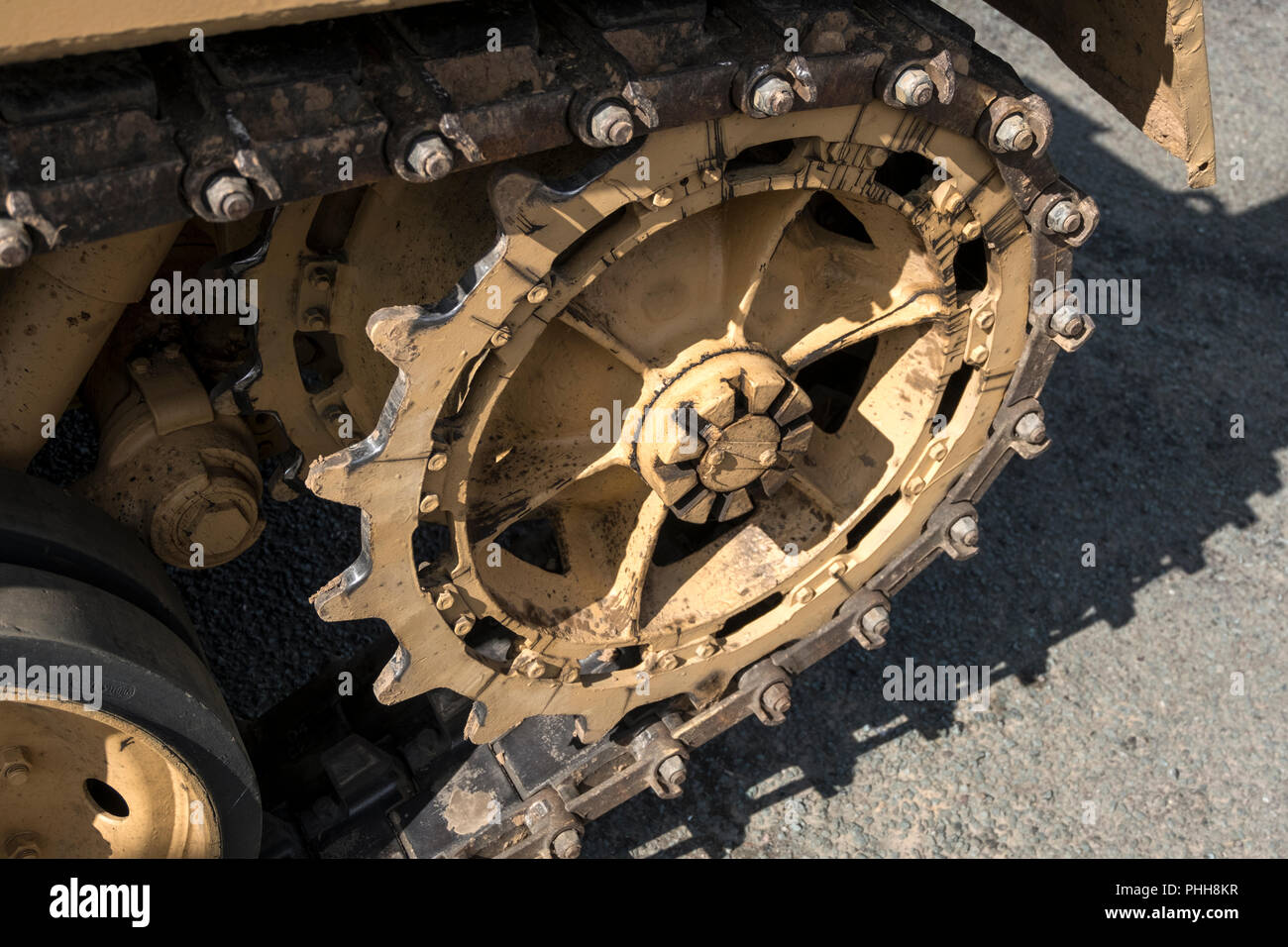 Front drive sprocket and track on a FV 432 military vehicle Stock Photo