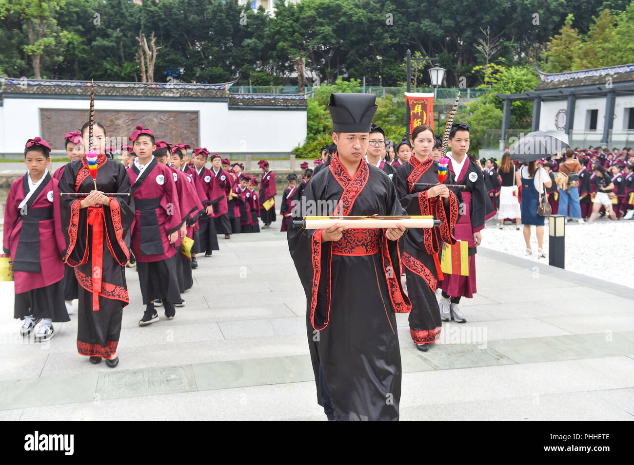 Fuzhou, China's Fujian Province. 1st Sep, 2018. Some 200 students engage in an activity to pay respects to their teachers in Fuzhou, capital of southeast China's Fujian Province, Sept. 1, 2018. The activity is held to greet the new semester on the school opening day which falls on Sept. 1. Credit: Song Weiwei/Xinhua/Alamy Live News Stock Photo