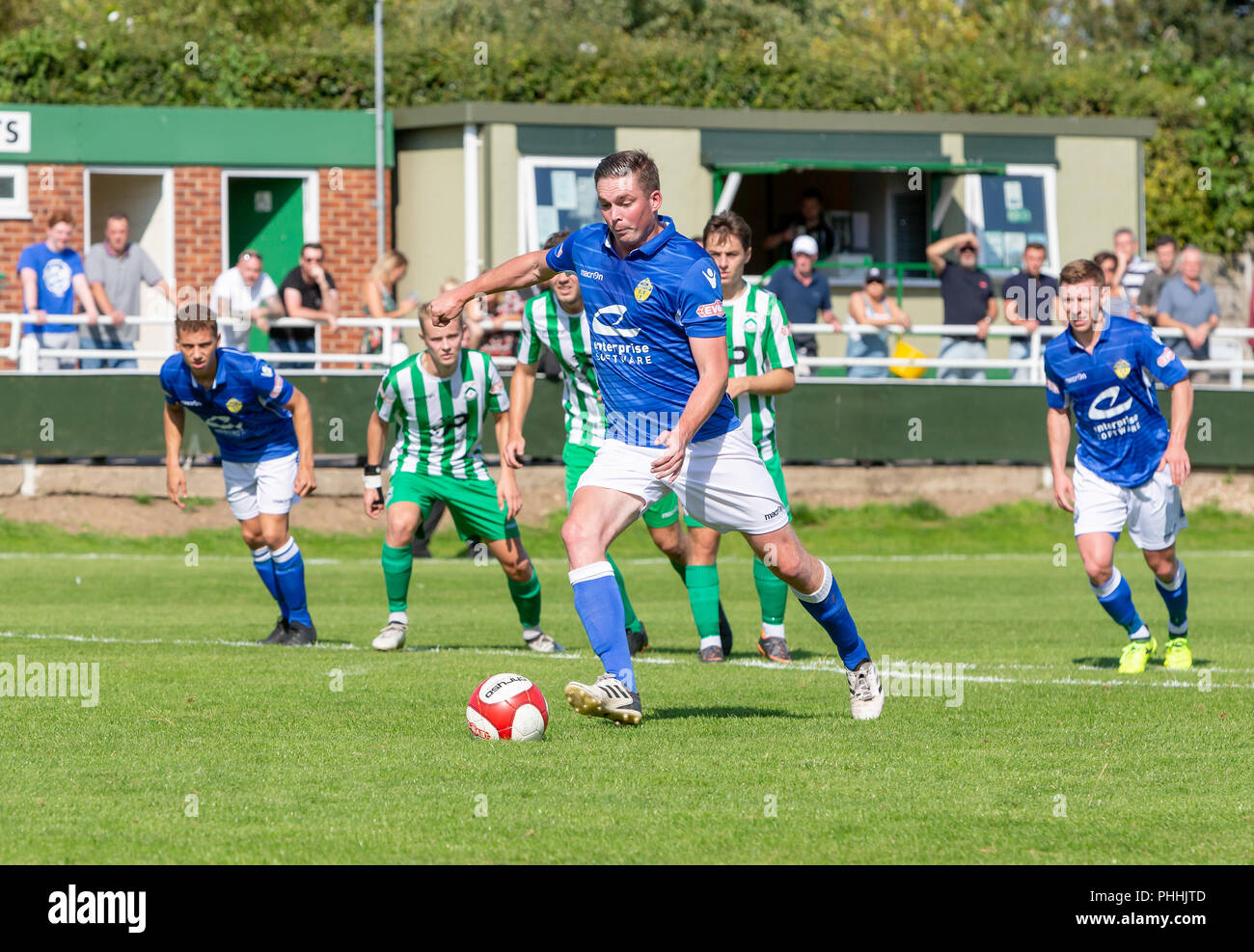 East Riding of Yorkshire, UK. 01 September 2018 - North Ferriby United A.F.C in the East Riding of Yorkshire, England, known as The Villagers and playing in green, hosted a match against Warrington Town AFC, known as The Yellows and The Wire and playing in blue, Both clubs play in the Evo Stik Northern Premier League Premier Division, the seventh tier of English football. Credit: John Hopkins/Alamy Live News Stock Photo