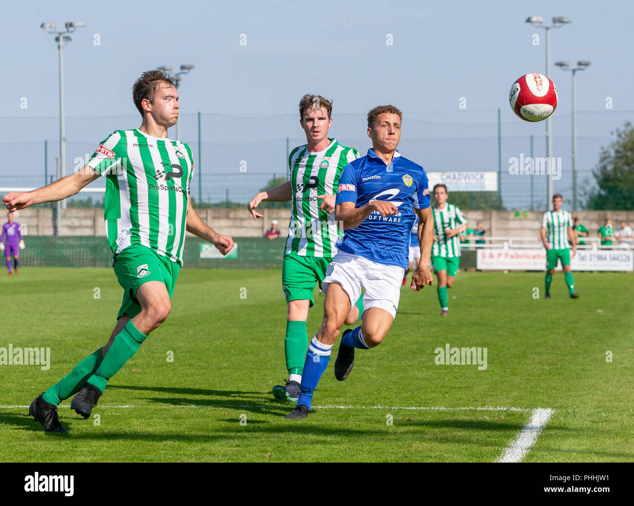 East Riding of Yorkshire, UK. 01 September 2018 - North Ferriby United A.F.C in the East Riding of Yorkshire, England, known as The Villagers and playing in green, hosted a match against Warrington Town AFC, known as The Yellows and The Wire and playing in blue, Both clubs play in the Evo Stik Northern Premier League Premier Division, the seventh tier of English football. Credit: John Hopkins/Alamy Live News Stock Photo