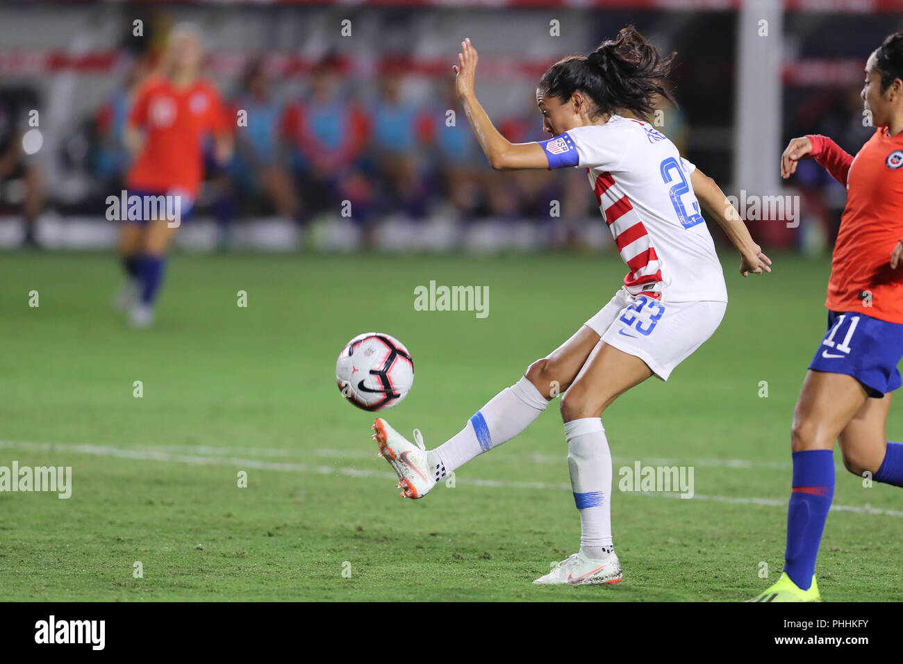 August 31, 2018: USA forward Christen Press (23) tries to flip the ball over the goalkeeper during the game between Chile and USA on August 31, 2018, at the StubHub Center in Carson, CA. USA. (Photo by Peter Joneleit) Stock Photo