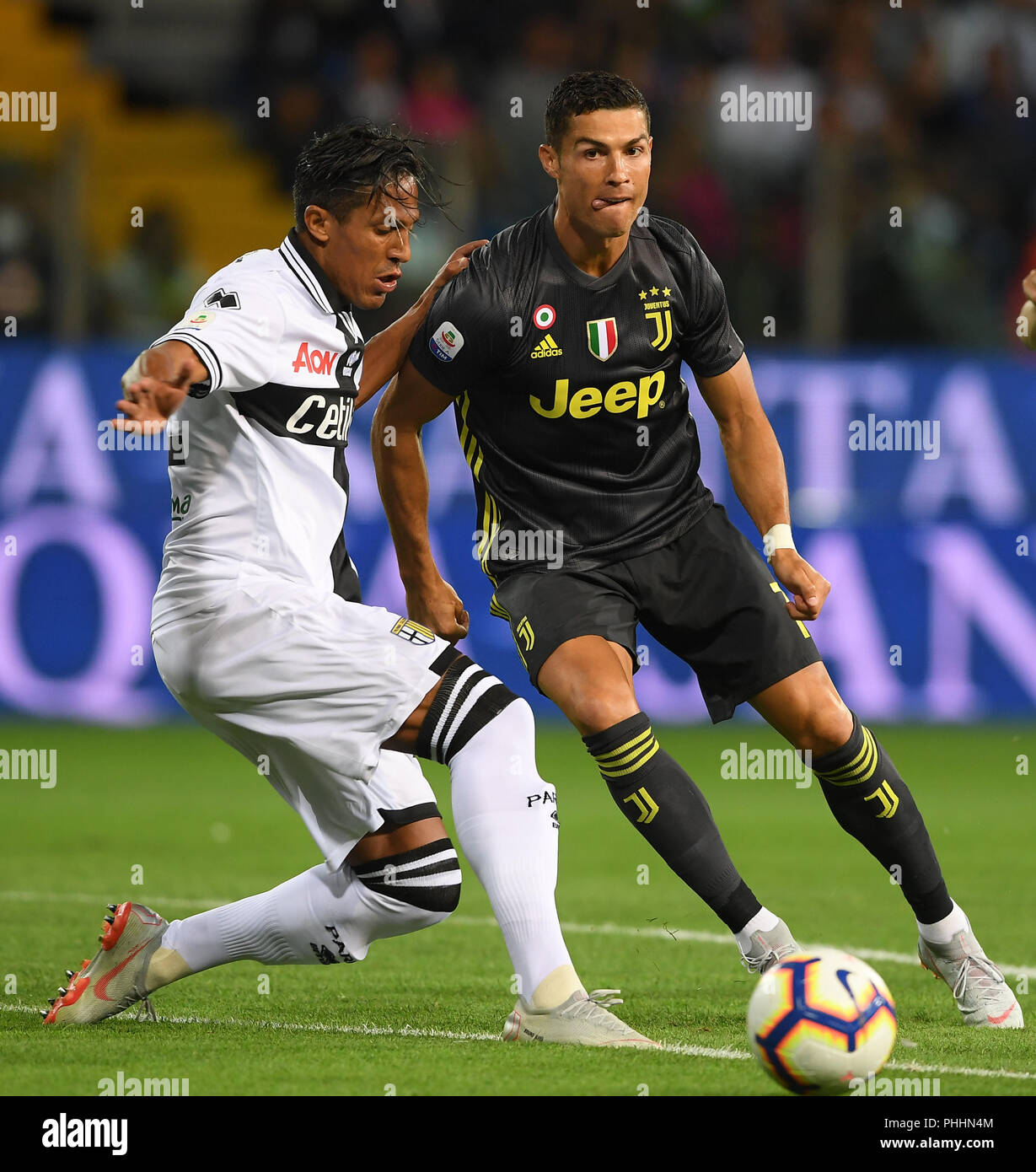 Parma, Italy. 1st Sep, 2018. Parma's Bruno Alves (L) vies with Juventus' Cristiano Ronaldo during a Serie A soccer match between FC Juventus and Parma in Parma, Italy, Sept. 1, 2018. Juventus won 2-1. Credit: Alberto Lingria/Xinhua/Alamy Live News Stock Photo