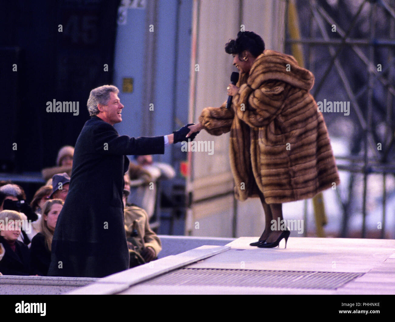 Washington, District of Columbia, USA. 17th Jan, 1993. United States President-elect Bill Clinton shakes hands with entertainer Aretha Franklin at the concert at the Lincoln Memorial that was part of the ''American Reunion'' celebration on the National Mall on January 17, 1993 Credit: Howard L. Sachs/CNP/ZUMA Wire/Alamy Live News Stock Photo