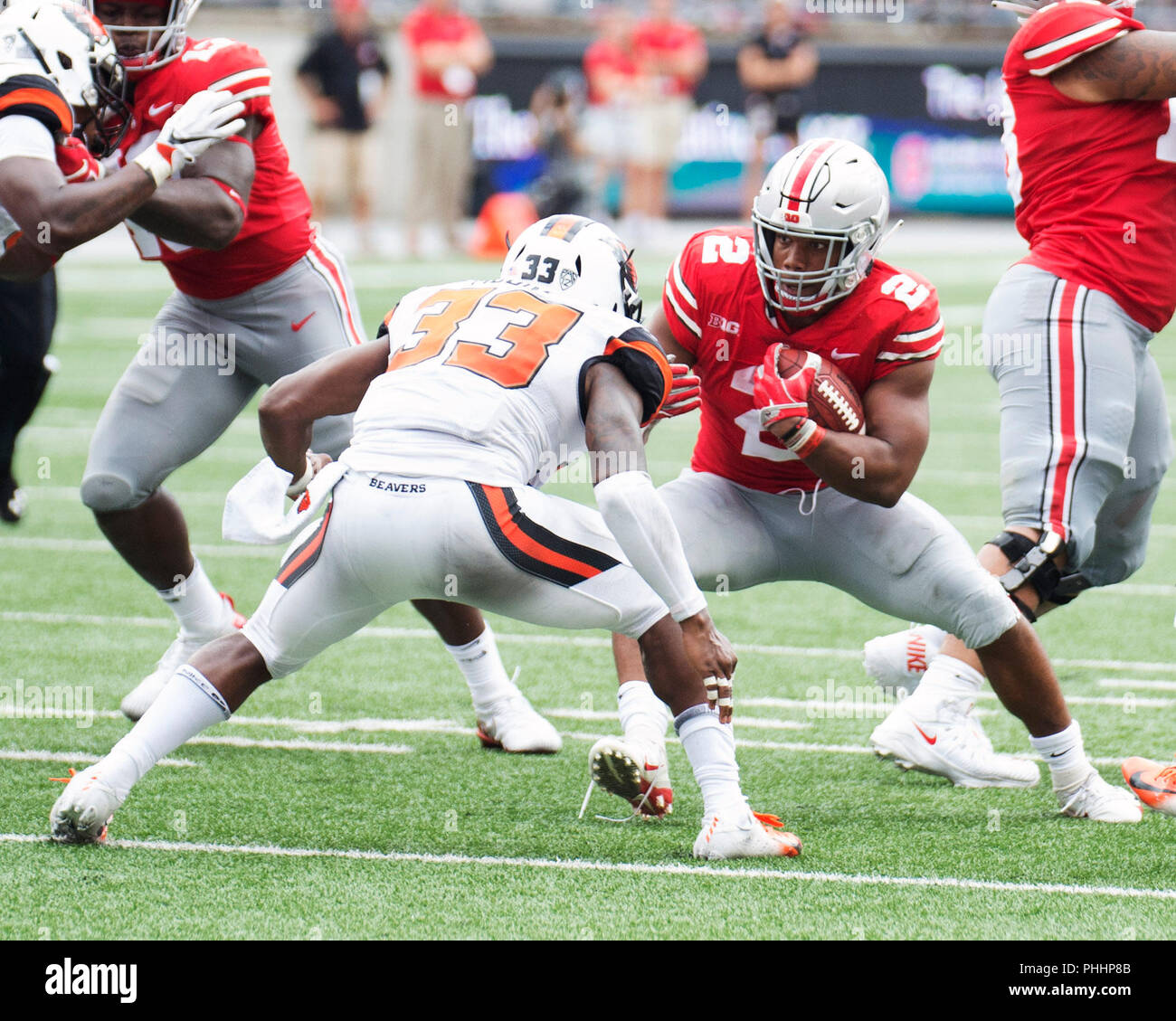 September 1, 2018:Ohio State Buckeyes running back J.K. Dobbins (2) goes one on one with Oregon State Beavers safety Jalen Moore (33) at the NCAA football game between the Oregon State Beavers & Ohio State Buckeyes at Ohio Stadium in Columbus, Ohio. Brent Clark/Cal Sport Media Stock Photo