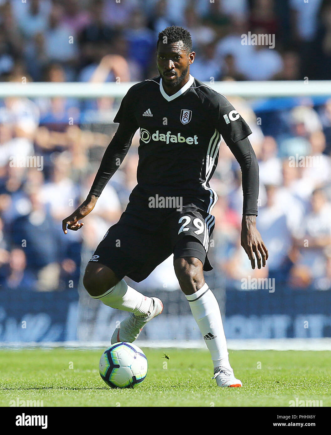 Fulham's Andre-Frank Zambo Anguissa during the Premier League match at the AMEX Stadium, Brighton. PRESS ASSOCIATION Photo. Picture date: Saturday September 1, 2018. See PA story SOCCER Brighton. Photo credit should read: Gareth Fuller/PA Wire. RESTRICTIONS: No use with unauthorised audio, video, data, fixture lists, club/league logos or 'live' services. Online in-match use limited to 120 images, no video emulation. No use in betting, games or single club/league/player publications. Stock Photo