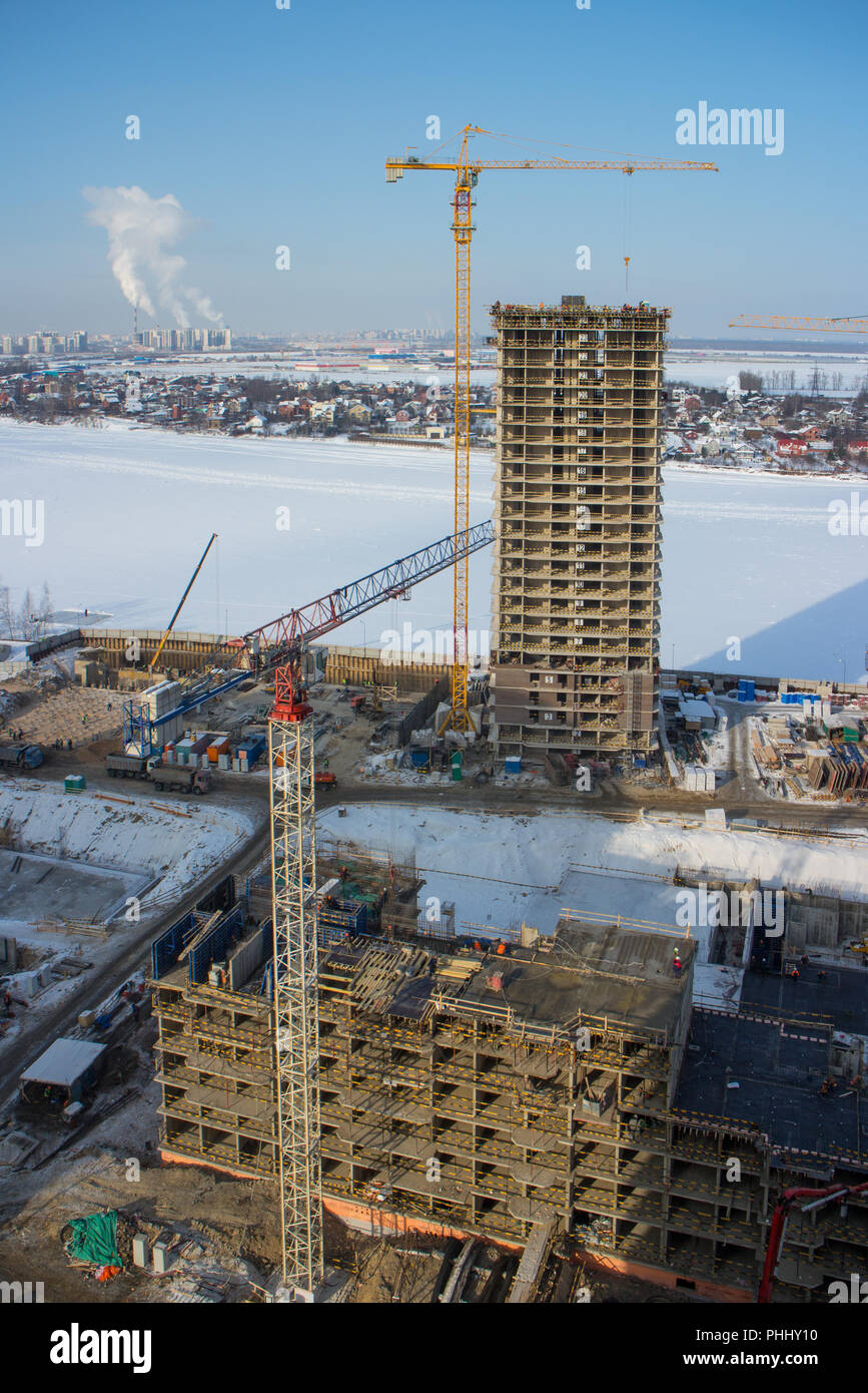 Tower cranes over skyscraper Stock Photo Alamy