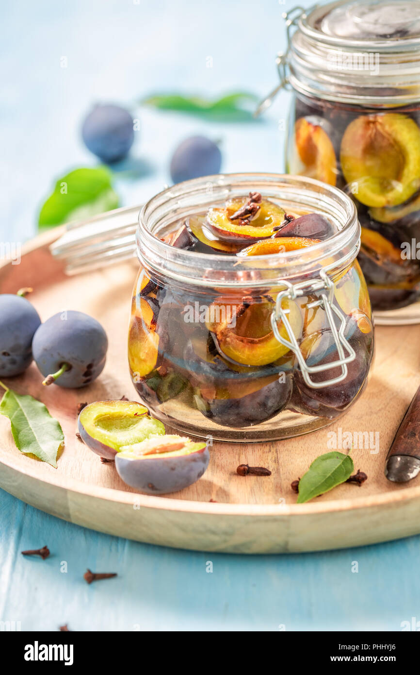 Homemade pickled purple plums in the jar Stock Photo - Alamy