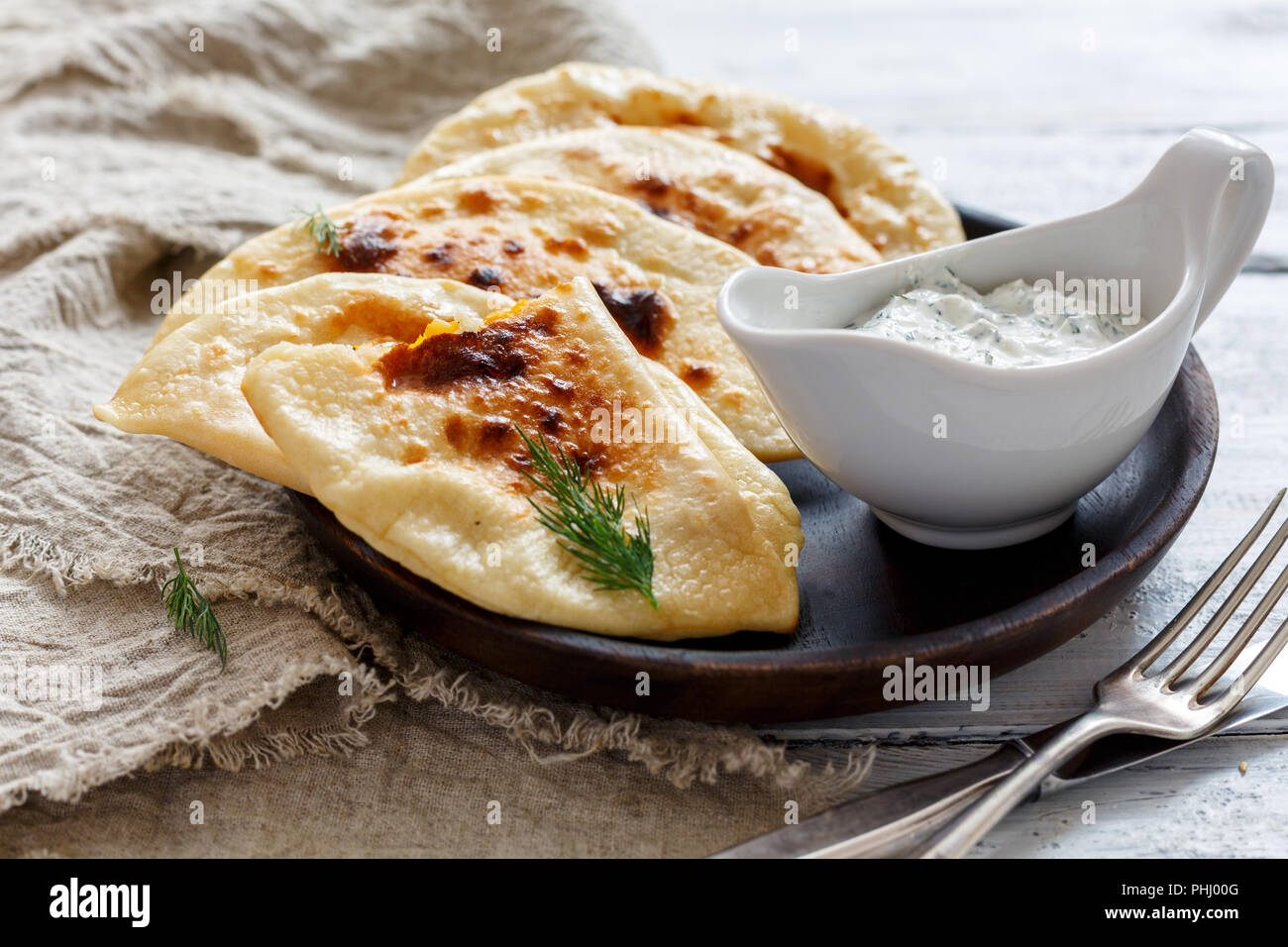 Flat bread with pumpkin filling. Stock Photo