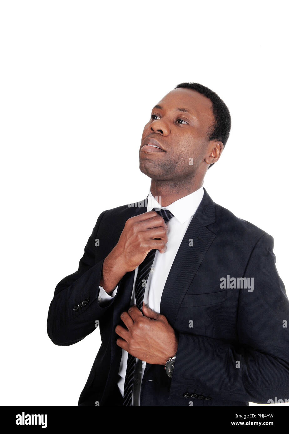 African business man fixing his tie Stock Photo - Alamy