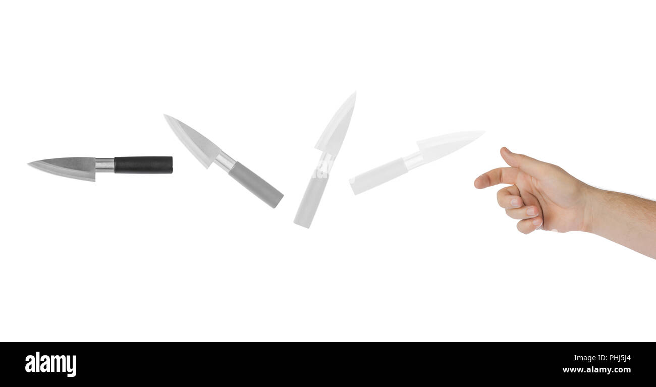 Hand is throwing a knife Stock Photo Alamy
